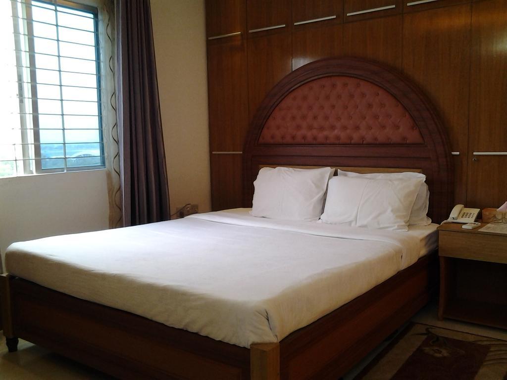 Hotel Afford Inn Daca Quarto foto