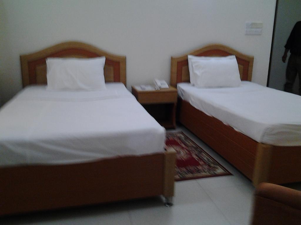 Hotel Afford Inn Daca Quarto foto